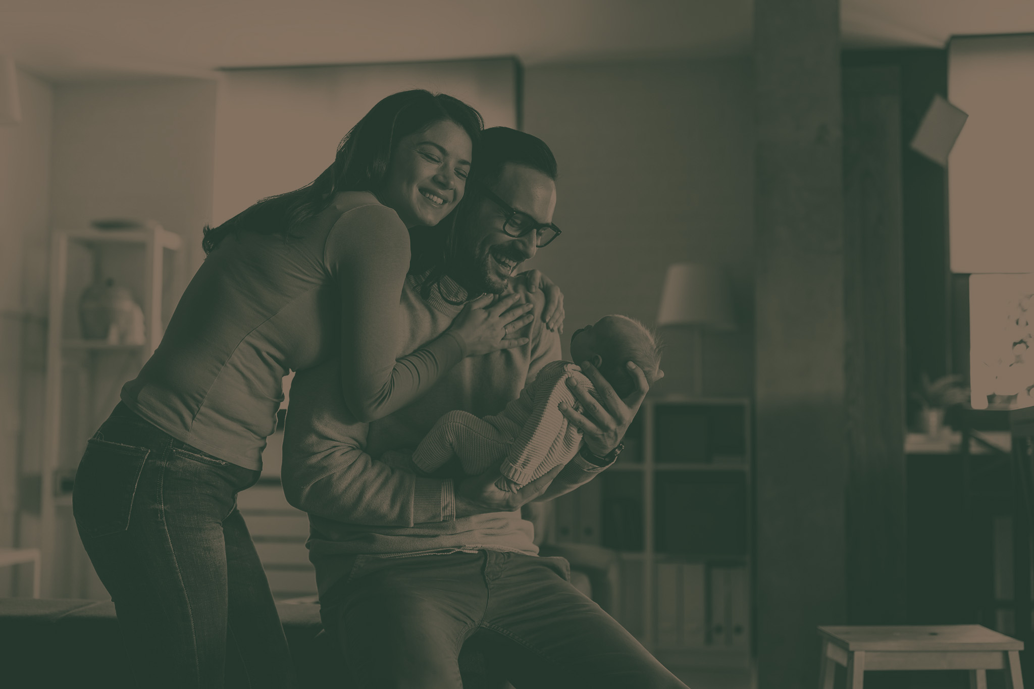 Family, parenthood and people concept. Happy young mother, father with new born baby at home